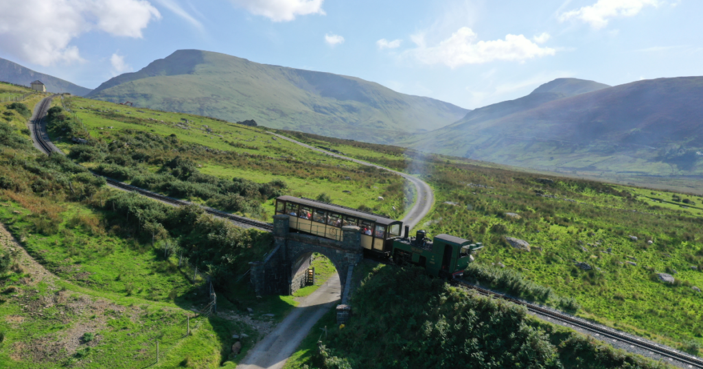 Snowdon Mountain Railway steam locomotive crossing a bridge